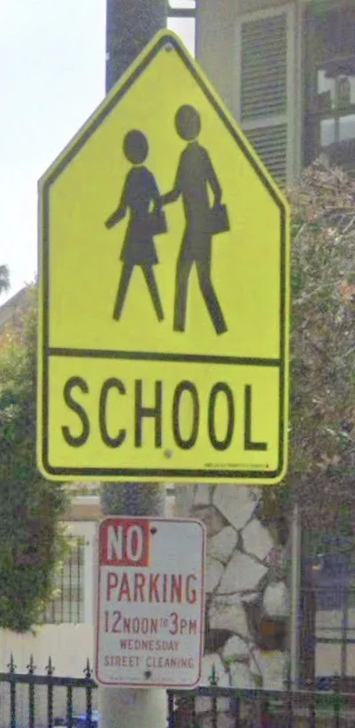 Posted sign on N Kenmore Ave under a School sign: No parking, 12 noon to 3pm, Wednesday, street cleaning.