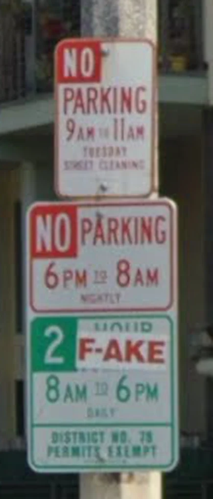 A pole carrying a stack of signs: sweeping 9 to 11 Tuesday, No Parking 6pm to 8am nightly, and 2 hour parking 8am to 6pm with district permits exempt.